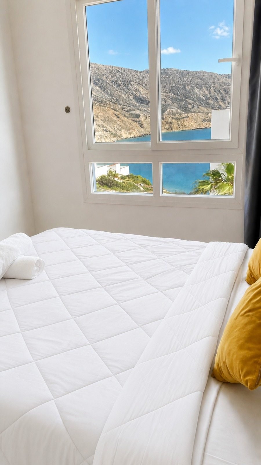 Sea View Apartment bedroom with ocean view at Padova Surf House